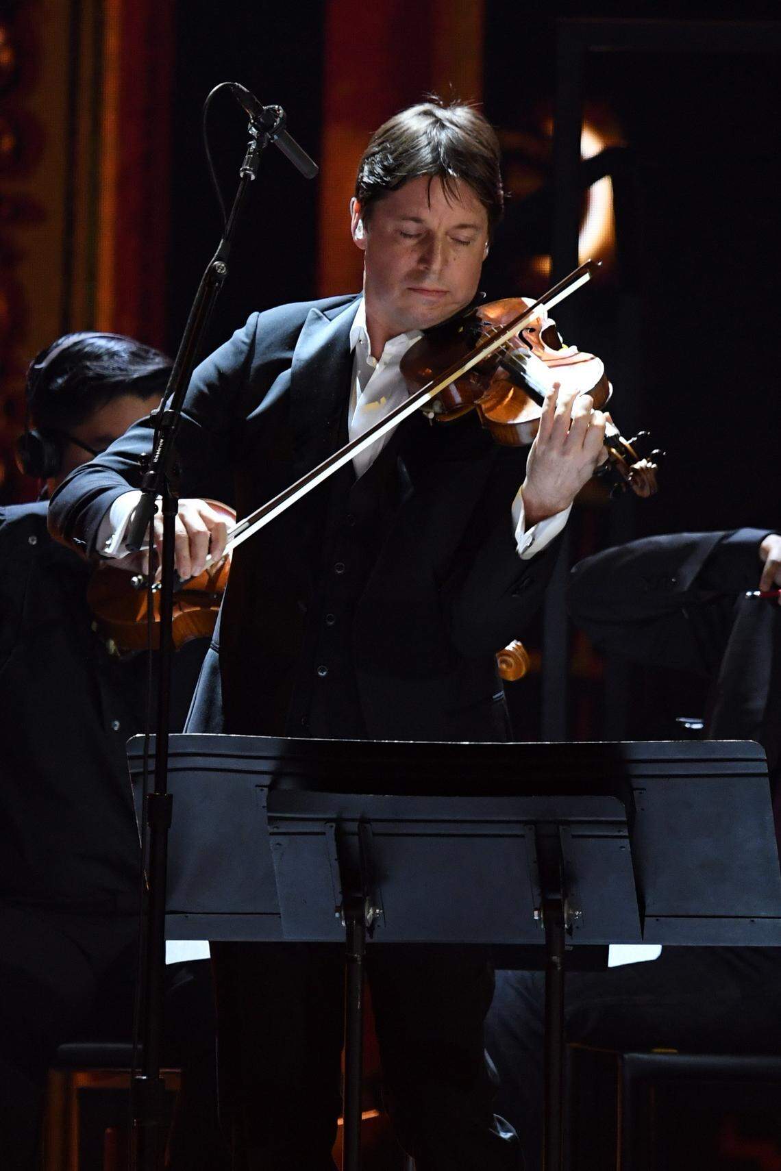 LOS ANGELES, CALIFORNIA - JANUARY 26: Joshua Bell performs onstage during the 62nd Annual GRAMMY Awards at STAPLES Center on January 26, 2020 in Los Angeles, California. (Photo by Kevin Winter/Getty Images for The Recording Academy )
