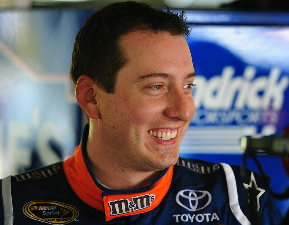5/27/10 NASCAR Sprint Cup Series driver Kyle Busch enjoys a break from practice in the garage at Charlotte Motor Speedway Thursday.  JEFF SINER - jsiner@charlotteobserver.com