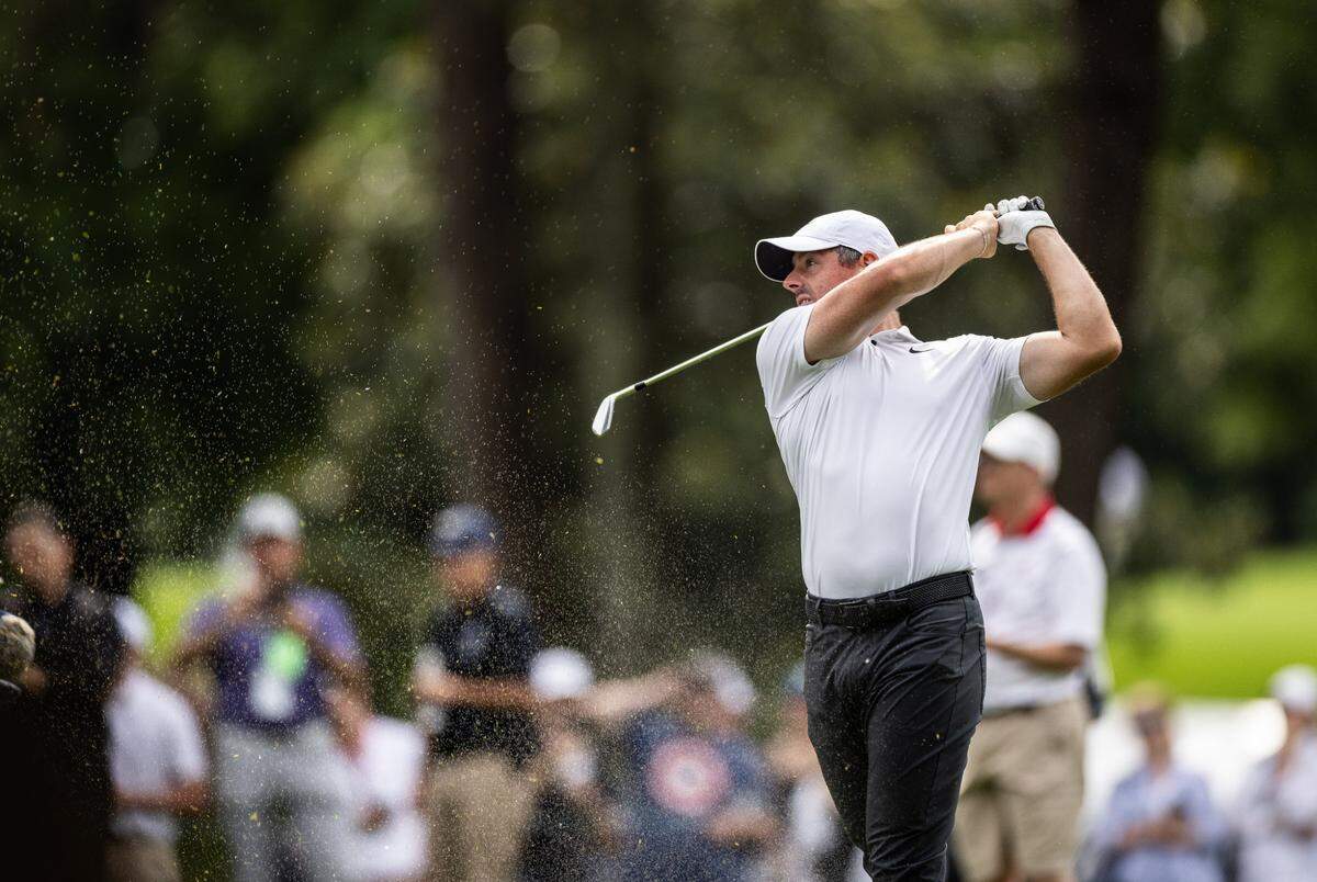 Rory McIlroy hits from the 10th fairway during round one of the Wells Fargo Championship at Quail Hollow Club in Charlotte, N.C., on Thursday, May 9, 2024.