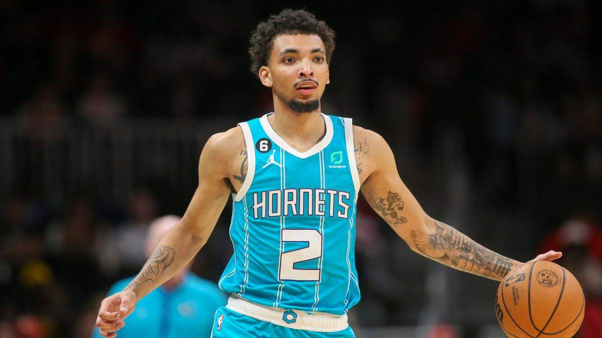 Charlotte Hornets guard James Bouknight (2) dribbles in the first half of a NBA basketball game against the Atlanta Hawks Sunday, Oct. 23, 2022 in Atlanta. (AP Photo/Brett Davis)