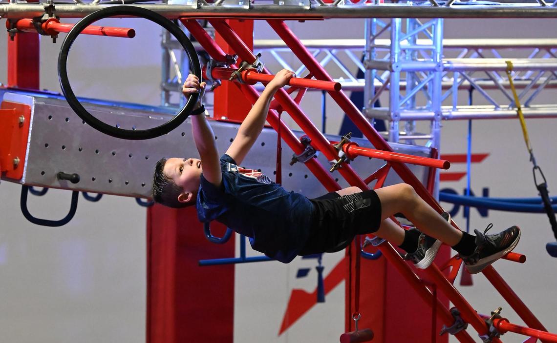 Ryan Hellman, 10 yrs., works his way through a competition course at Ninja Nation in Huntersville, NC on Wednesday, February 8, 2023.