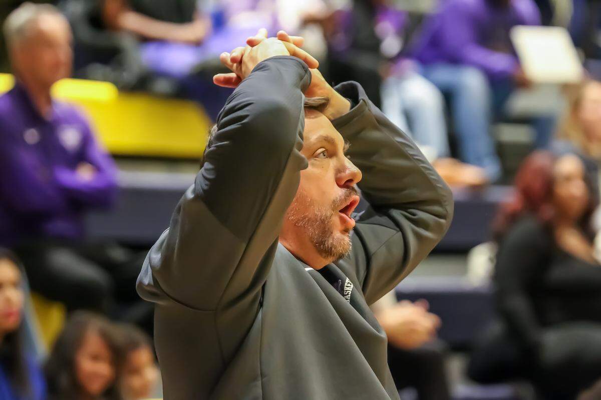 Ambassador Christian coach Scott Taylor reacts to a play Friday.