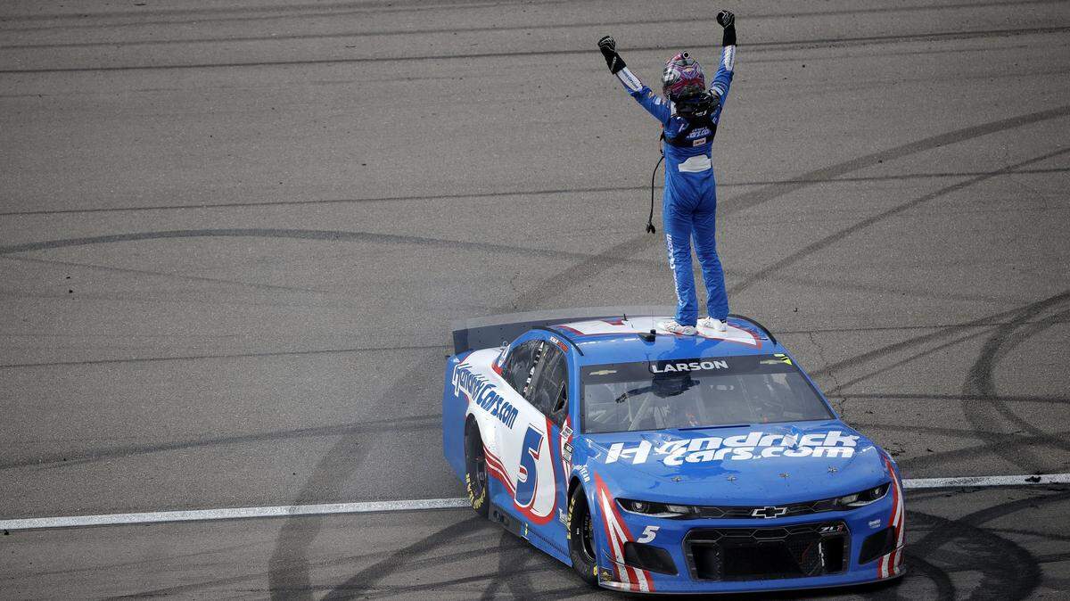 LAS VEGAS, NEVADA - MARCH 07: Kyle Larson, driver of the #5 HendrickCars.com Chevrolet, celebrates after winning the NASCAR Cup Series Pennzoil 400 presented by Jiffy Lube at the Las Vegas Motor Speedway on March 07, 2021 in Las Vegas, Nevada. (Photo by Chris Graythen/Getty Images)