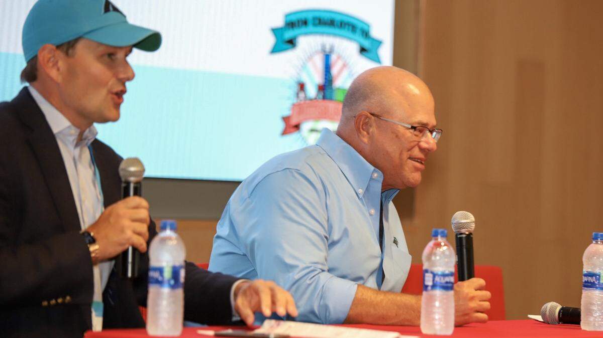 Brian Leary of Crescent Communities speaks with Carolina Panthers owner David Tepper at Carnegie Mellon during the Charlotte Regional Business Alliance’s annual Inter-City Visit to Pittsburgh Wednesday.