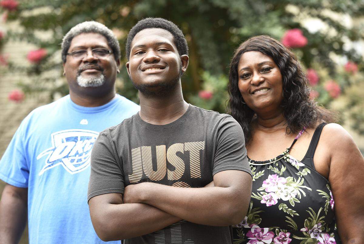 Because of kidney and bladder problems discovered before he was born, Isaac Brown has needed the support of his parents Will Brown (Left) and Jamie Brown (Right) throughout his life.