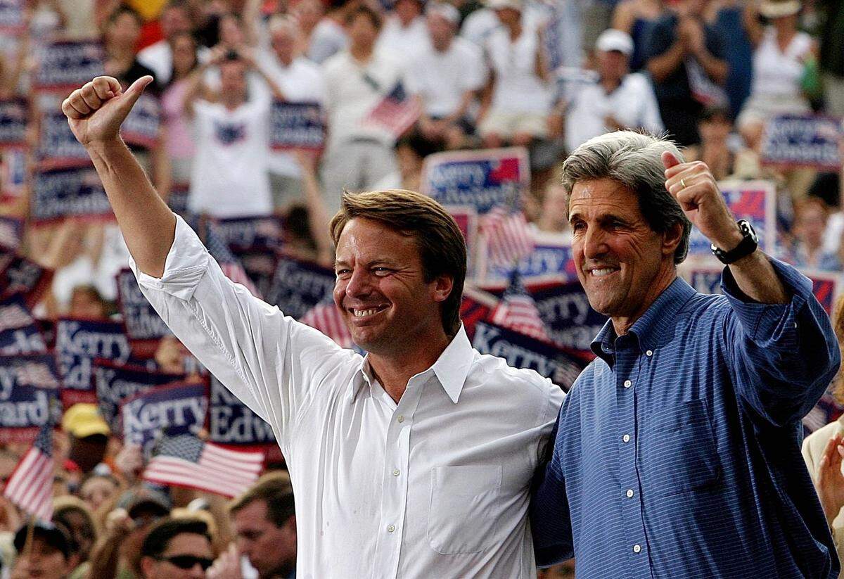Sen. John Edwards, left, and Sen. John Kerry campaign at North Carolina State University in Raleigh, on July 10, 2004.