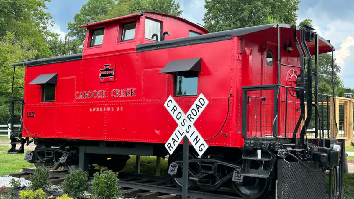 The 1933 Little Red Caboose on River Airbnb rental is located in Andrews, North Carolina.