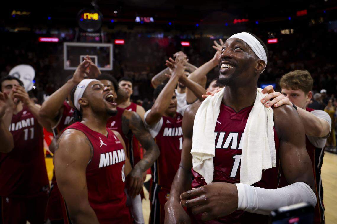 Miami Heat center Bam Adebayo (13) celebrates with teammates after scoring 83 points against the Washington Wizards, the second-highest single-game total in NBA history, on March 10,  Kaseya Center in Miami. The Heat won 150-129.