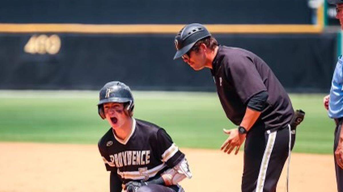 Tommy Walker let’s out a loud yeah as he hits the ball the outfield helping pull his team into the lead