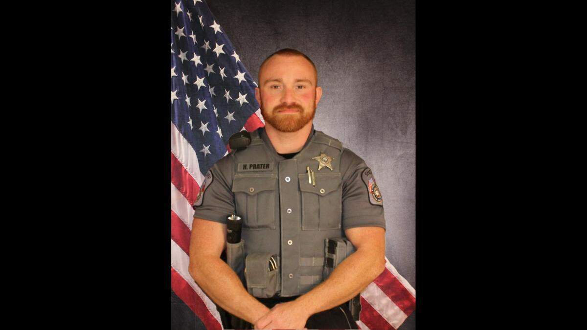 Lincoln County sheriff’s Deputy Holden Prater said he knew he had to act when he spotted a distraught man straddling a bridge 20 feet or so above a swollen river on Monday, Aug. 1, 2022.