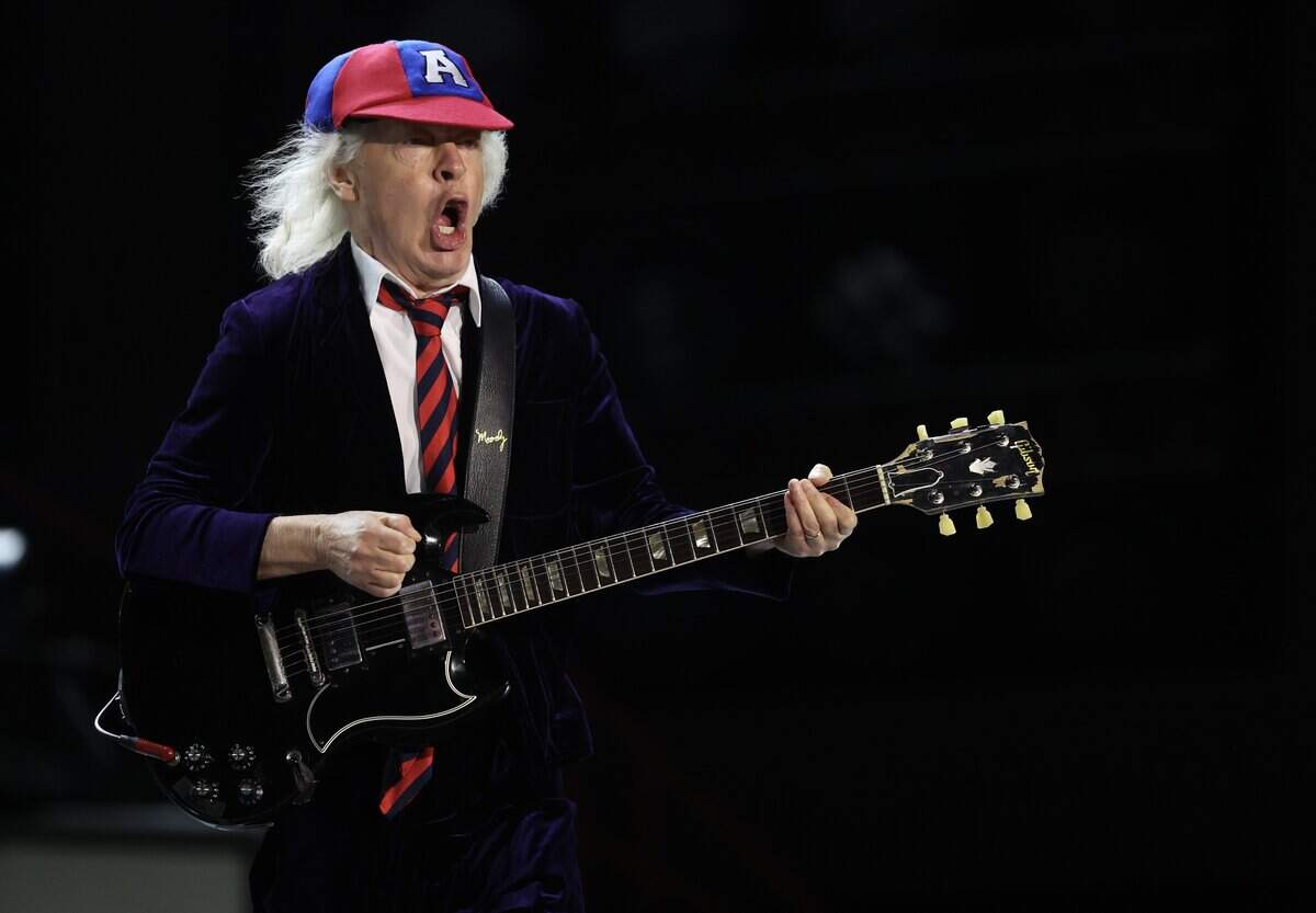 AC/DC lead guitarist Angus Young performs with the band at Bank of America Stadium in Charlotte on Saturday, July 11, 2026.