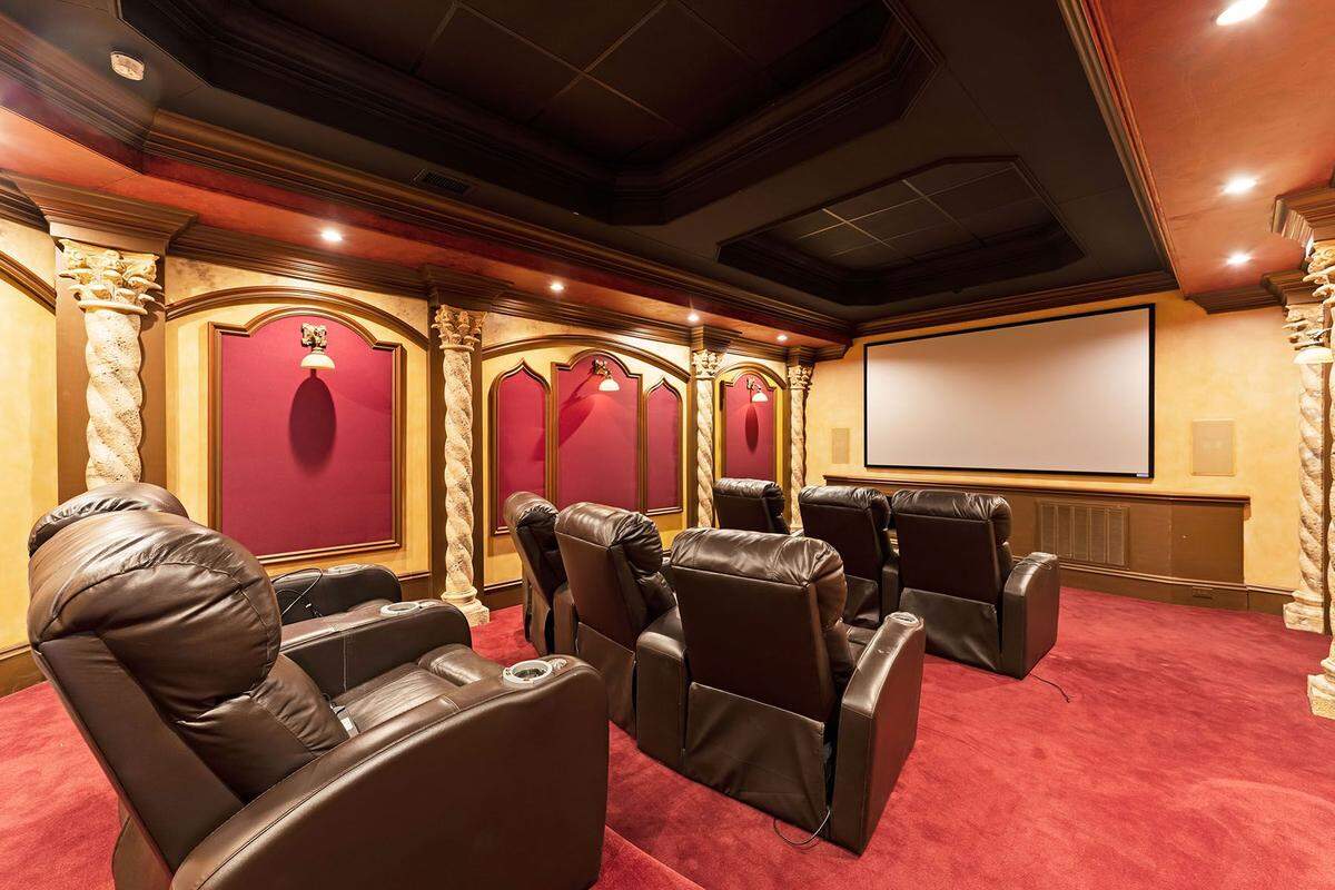The mansion includes this home theater among its many features.