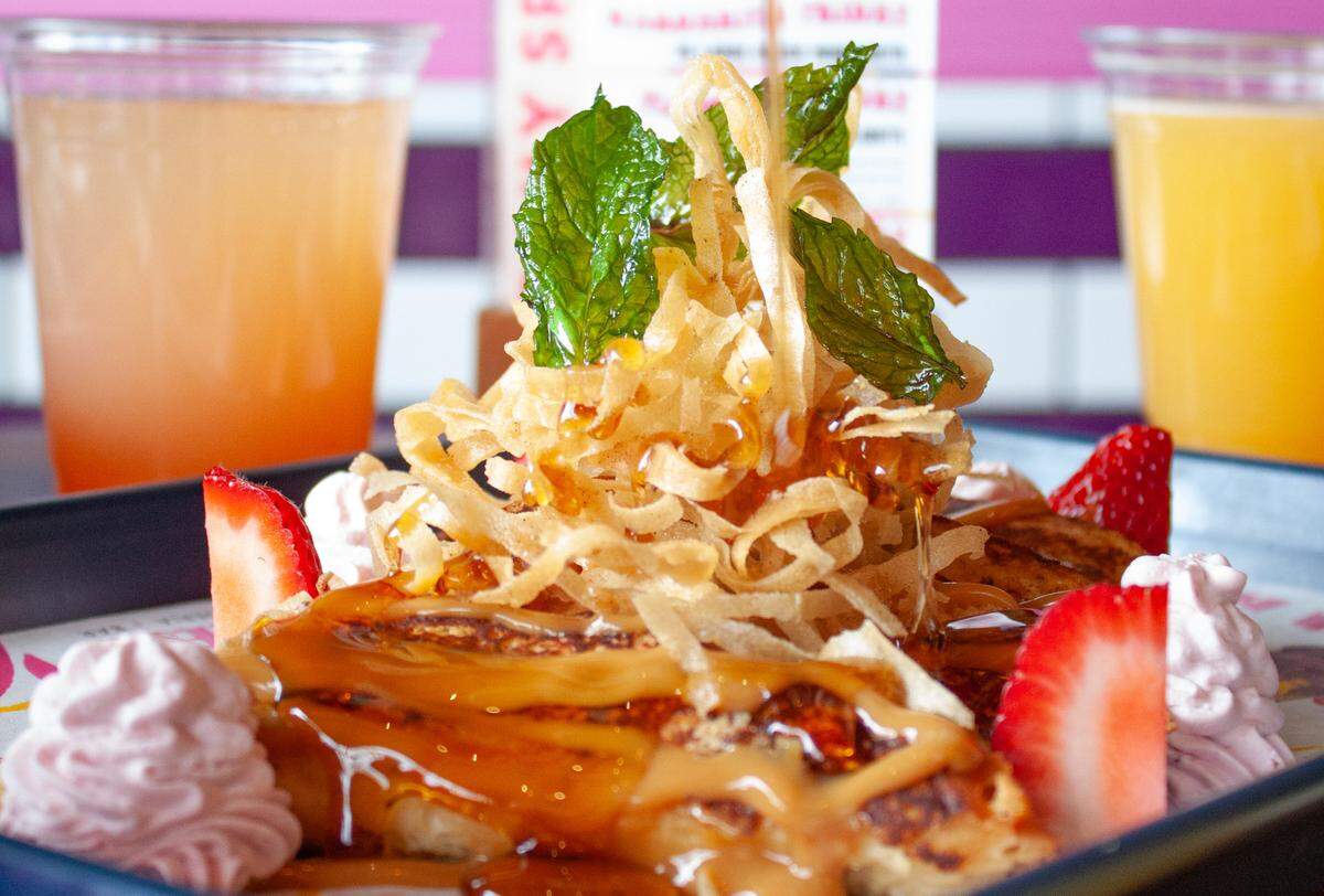 Que Fresa’s Fresa French Toast has tres leches brioche toast, strawberries, whipped cream, sopapilla strips, dulce de leche and maple syrup ($10.95).
