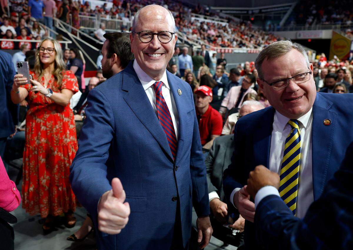 Dan Bishop, U.S. representative for North Carolina’s 8th Congressional District, gives the thumbs up as he meets with House Speaker Tim Moore and other Trump supporters during a rally at Bojangles Coliseum in Charlotte, NC on Wednesday, July 24, 2024.