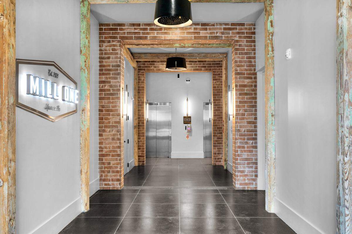 Mill One in Mooresville pays homage to the town’s first textile mill that was built in the 1890s. The original building was not salvageable, however, the beams and planks have been incorporated into the new design.
