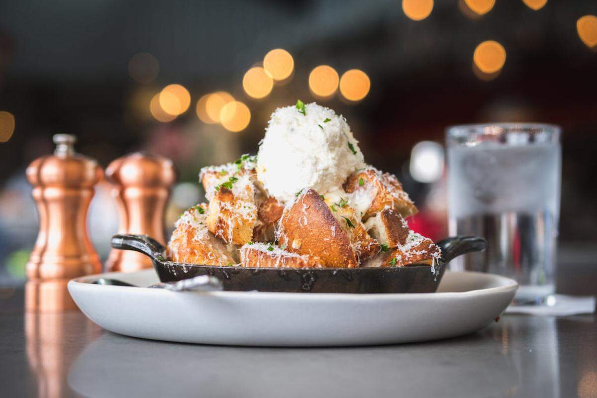 White Truffle Garlic Bread with house-made ricotta, mozzarella, grana podano and herbs ($12).