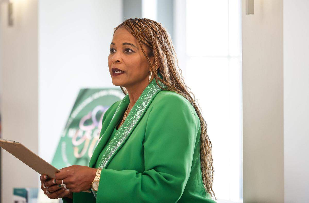 Tina Sykes-Mosley welcomes attendees to the inaugural meeting of Mothers Advocating for Real Change and Unwavering Support, a group for people who have lost a child to homicide, at Indian Trail Town Hall on May 15.