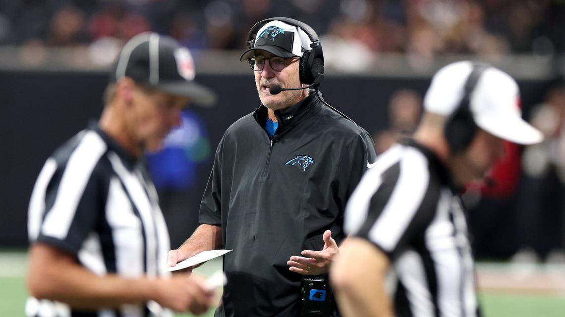 Carolina Panthers head coach Frank Reich talks with personnel upstairs as the team battles the Atlanta Falcons at Mercedes-Benz Stadium in Atlanta, GA on Sunday, September 10, 2023. The Falcons defeated the Panthers 24-10.