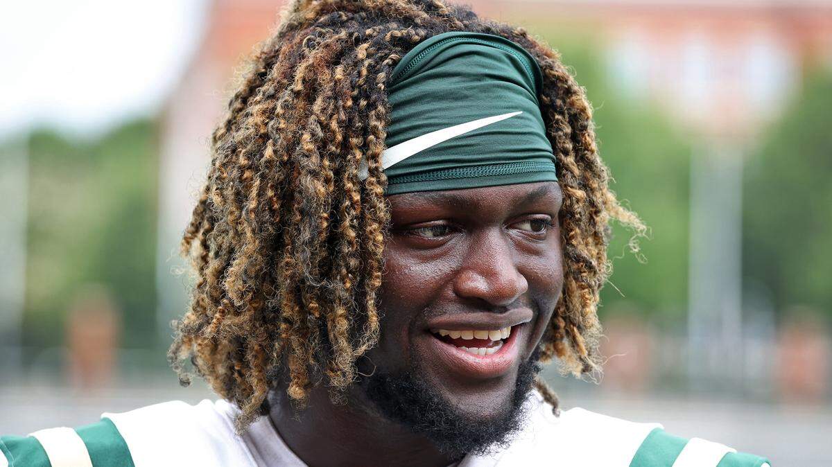 Charlotte 49ers linebacker Demetrius Knight II speaks to the media following the team’s first practice on August 4.