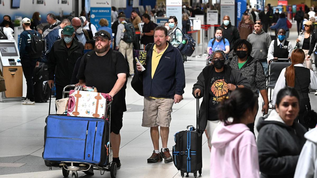 Travelers at the Charlotte airport should expect crowds during the busy summer travel season, officials say.