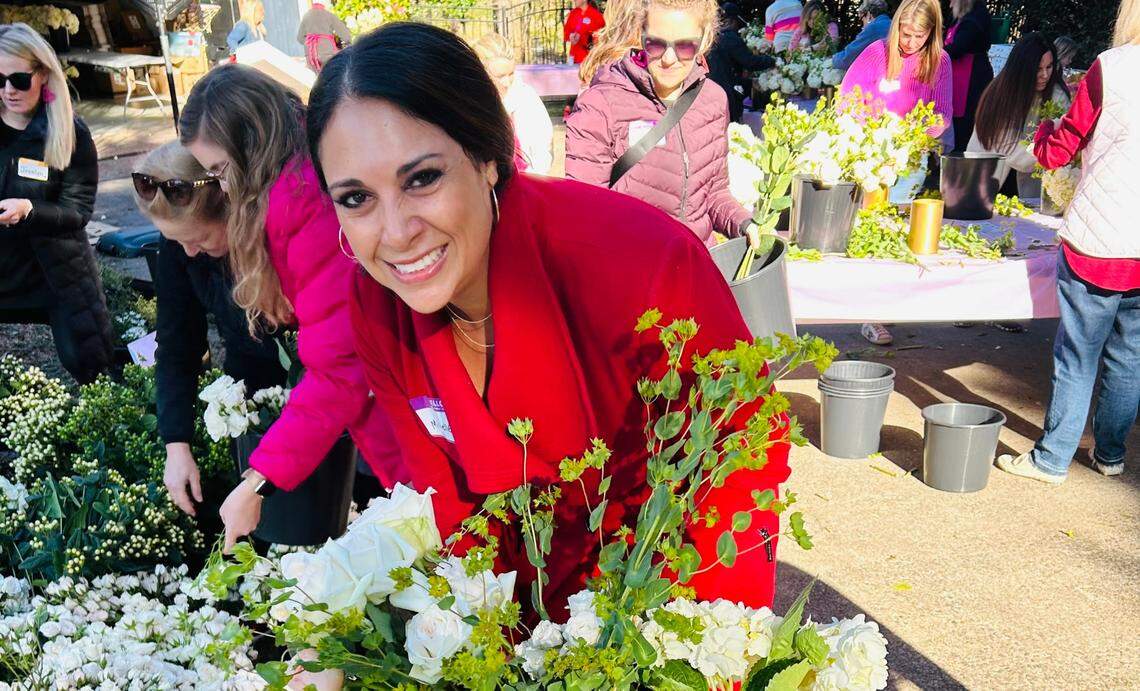 Michelle Boudin, photographed among fellow volunteers at Ashley Manning’s front yard in 2023.