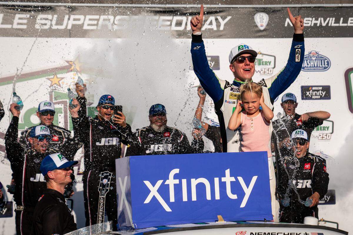 John Hunter Nemechek celebrates with his daughter, Aspen, after winning the NASCAR Xfinity Series Tennessee Lottery 250 at Nashville Superspeedway in Lebanon, Tenn., Saturday, June 29, 2024.