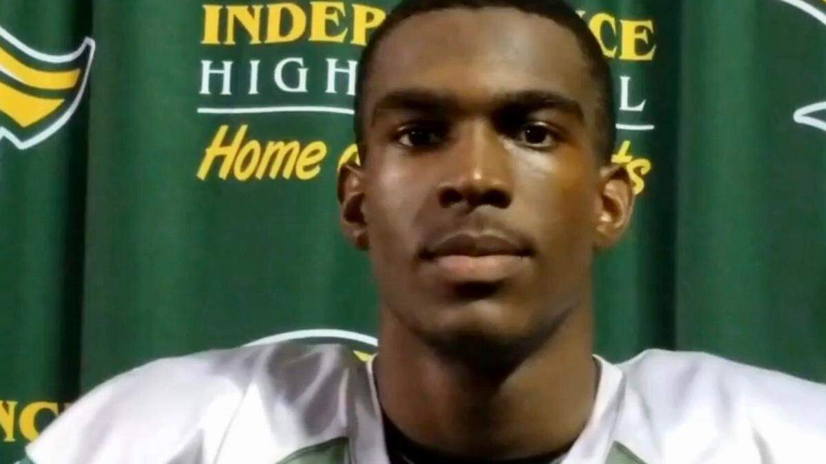 Independence High quarterback Davyne Simpson is in a local hospital after being placed in a medically induced coma.