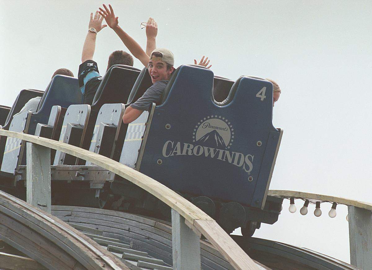 7/26/98. The chance to ride backwards is a crowd-pleaser on the “Thunder Road” roller coaster at Carowinds.