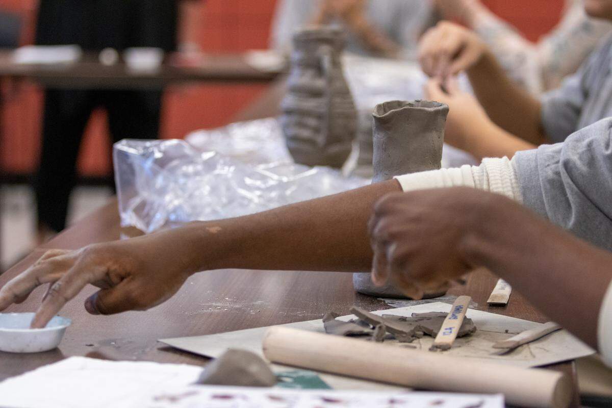 Detained teens and adults participate in the Bechtler Museum’s Jail Arts Initiative outreach program. This photo was taken during a class at the Mecklenburg County Juvenile Detention Center where students were working on ceramic projects.