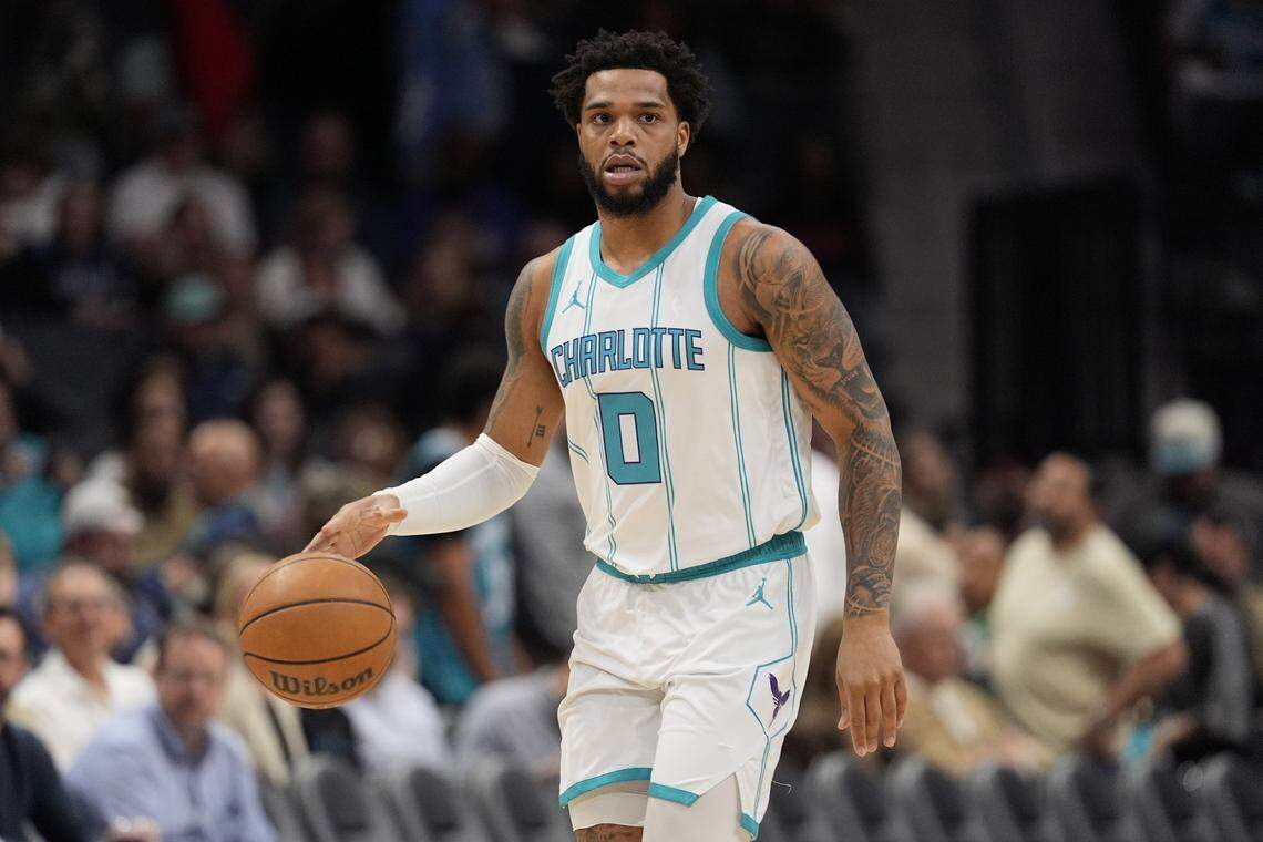 Charlotte Hornets forward Miles Bridges (0) brings the ball up court against the Utah Jazz during the first quarter at Spectrum Center. 