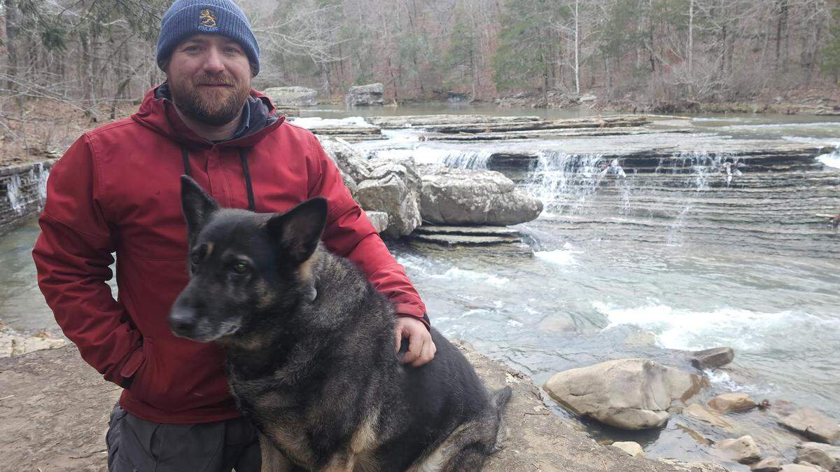Chris Palmer, 39, is believed to be with his dog, pictured here. His pickup was found at North Carolina’s Cape Point, at Cape Hatteras National Seashore, officials say.