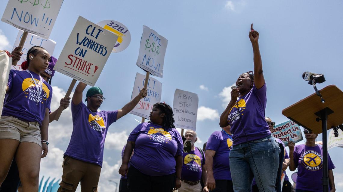 Airport service workers go on strike and hold a rally outside of the Charlotte Douglas International Airport in Charlotte.