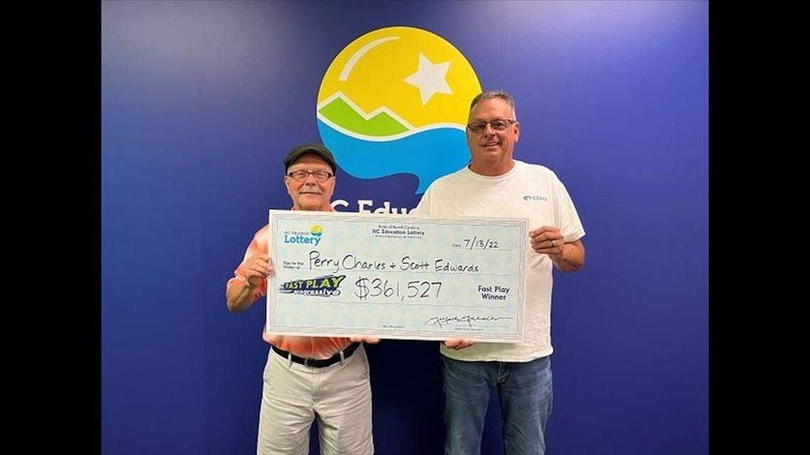 Perry Charles, left, and Scott Edwards are splitting the big prize after years of friendship, officials said.