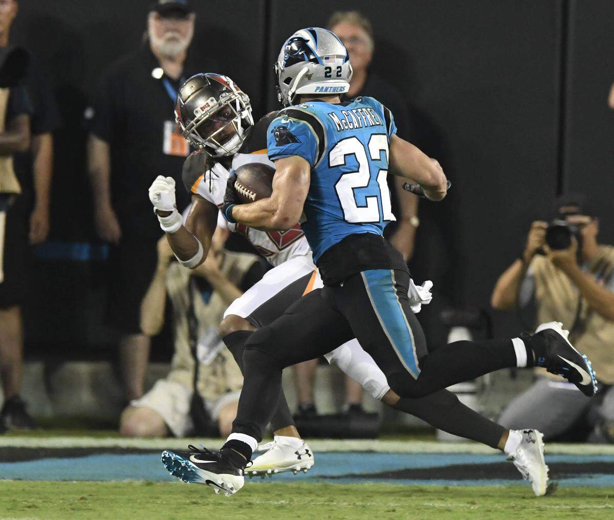 Tampa Bay Buccaneers cornerback Vernon Hargreaves prepares to tackle Panthers running back Christian McCaffrey (22) on fourth-and-1 from the 2. Hargreaves made the stop and Tampa Bay won, 20-14.