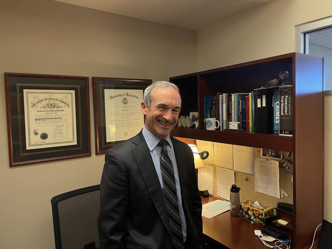 Glenn Cole poses for a photo in his office inside Mecklenburg County District Attorney’s Office before retiring at the end of February 2026.