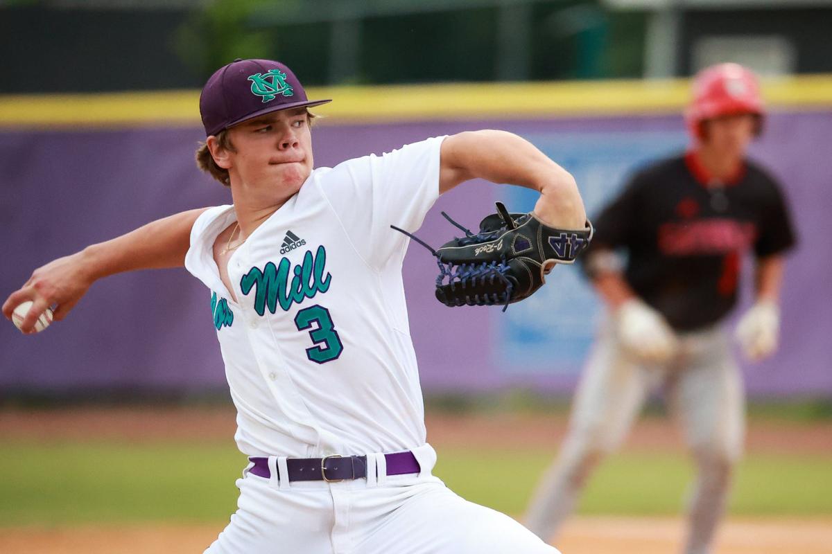 CONCORD, NC - MAY 13: Cox Mill Charger pitcher Jackson Caldwell pitches during the first inning against the Charlotte Catholic Cougars at Cox Mill High School in Concord, NC on May 13, 2024.