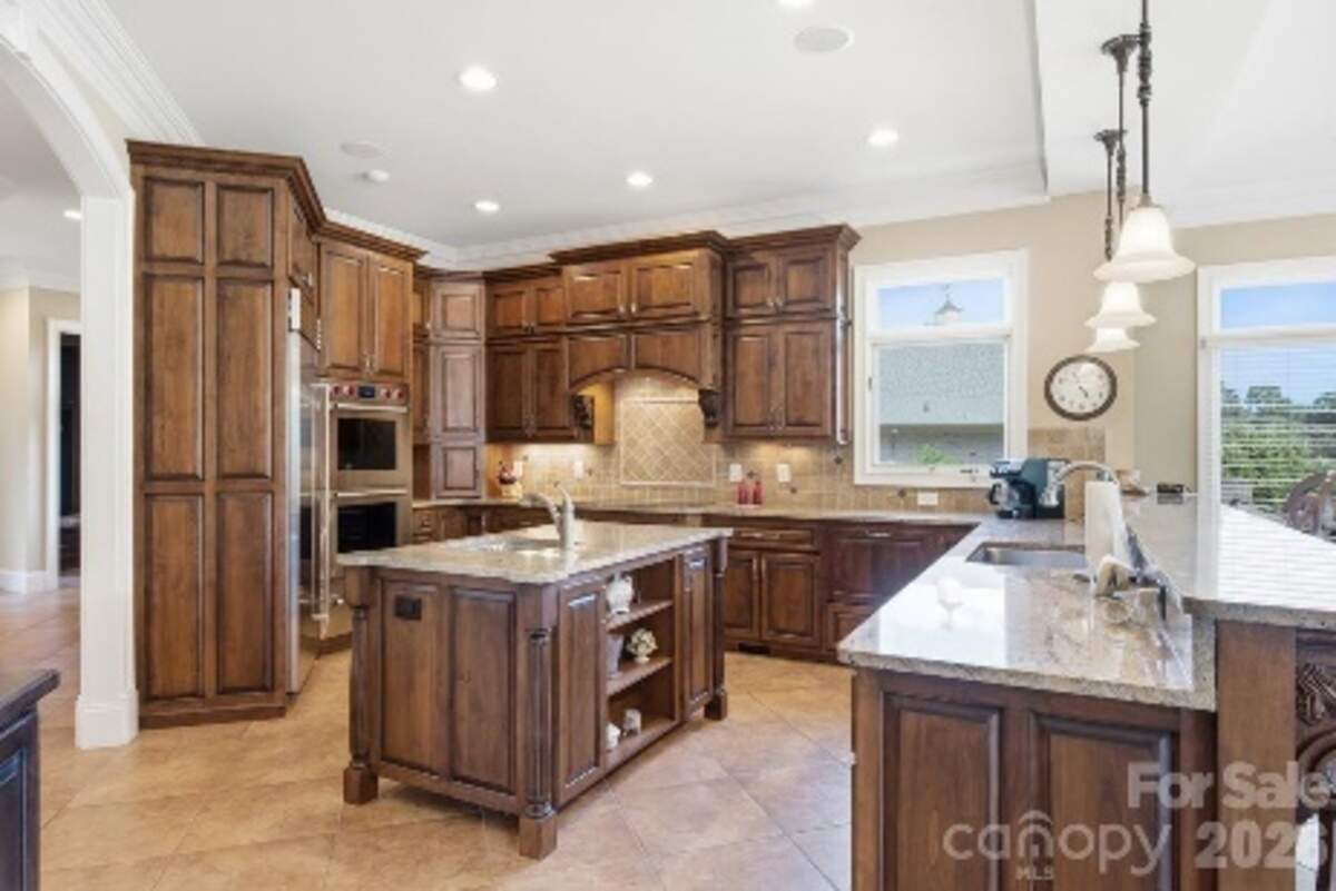 The kitchen of the mansion looks out to the property’s rolling countryside.