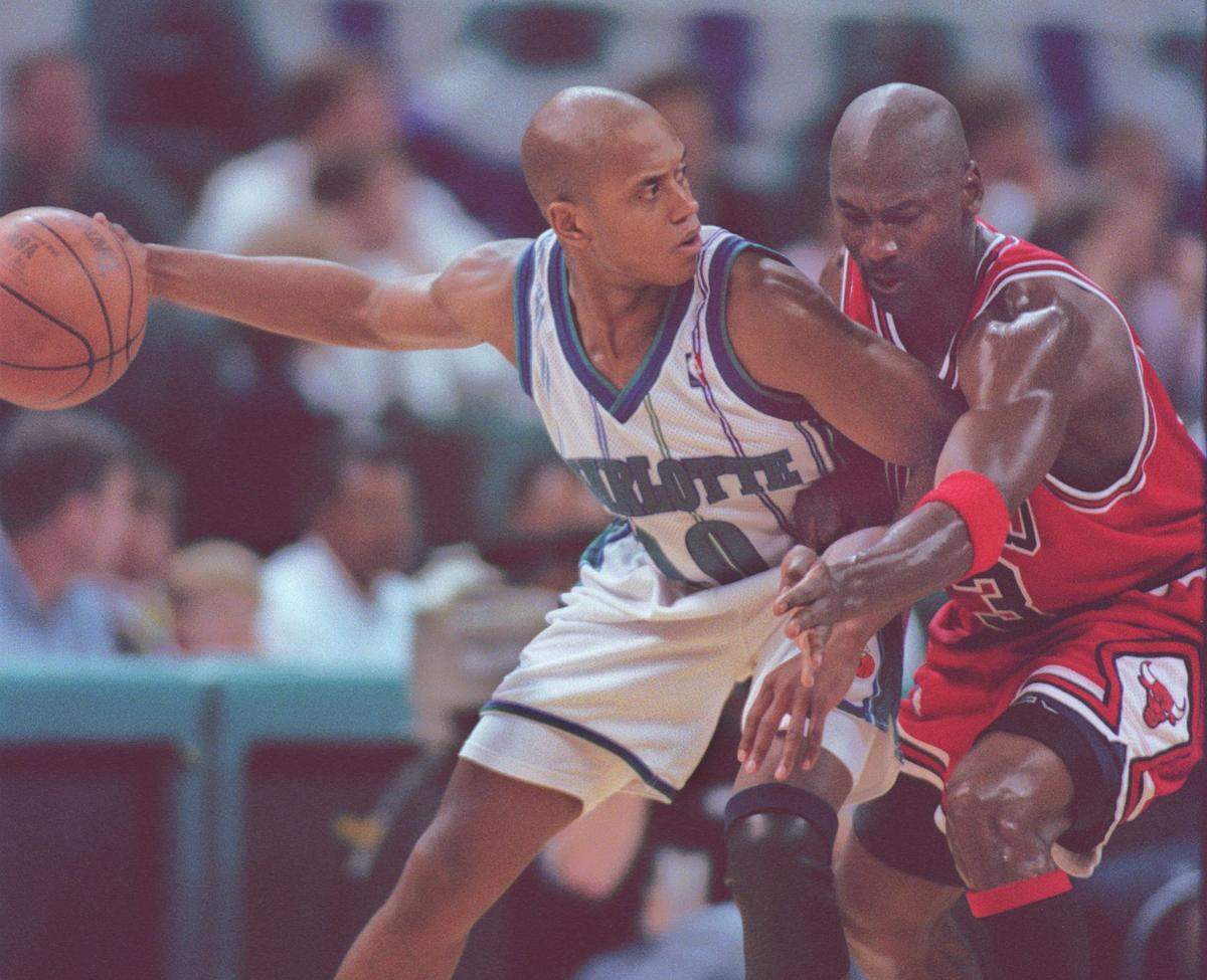 The Charlotte Hornets’ B.J. Armstrong tried to back Chicago’s Michael Jordan down during the teams’ 1998 playoff series.