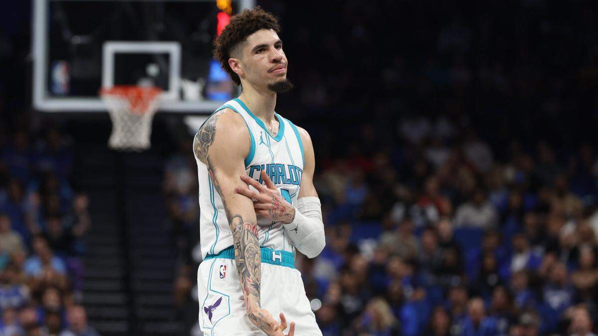 Charlotte Hornets guard LaMelo Ball (1) celebrates after he makes a three point basket against the Orlando Magic during the first quarter at Kia Center.