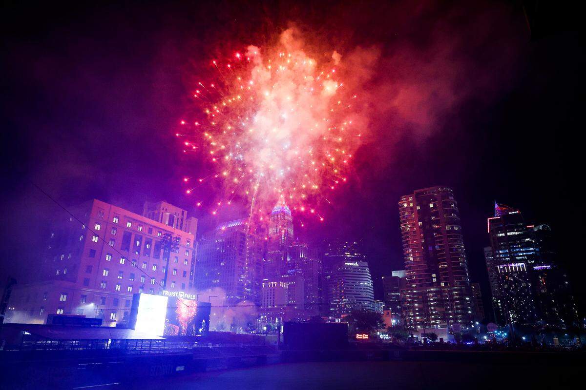 Fireworks illuminate uptown during SkyShow at Truist Field in Charlotte, N.C., Monday, July 4, 2022.