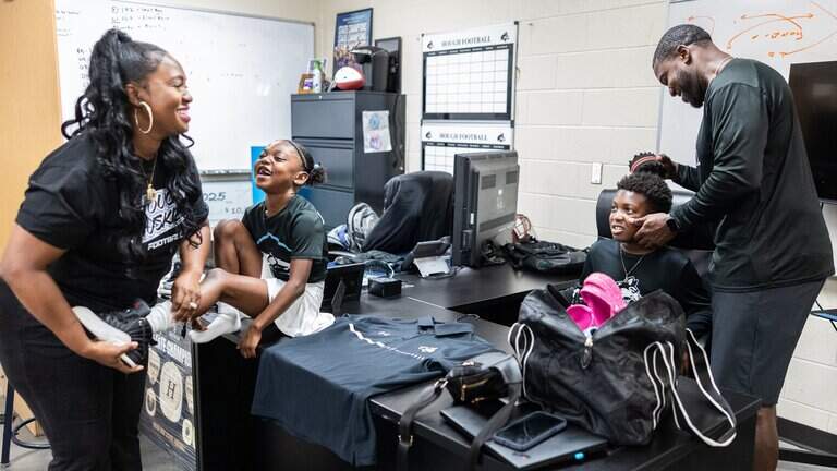 PHOTOS: Hough coach DeShawn Baker, wife Tracie and family