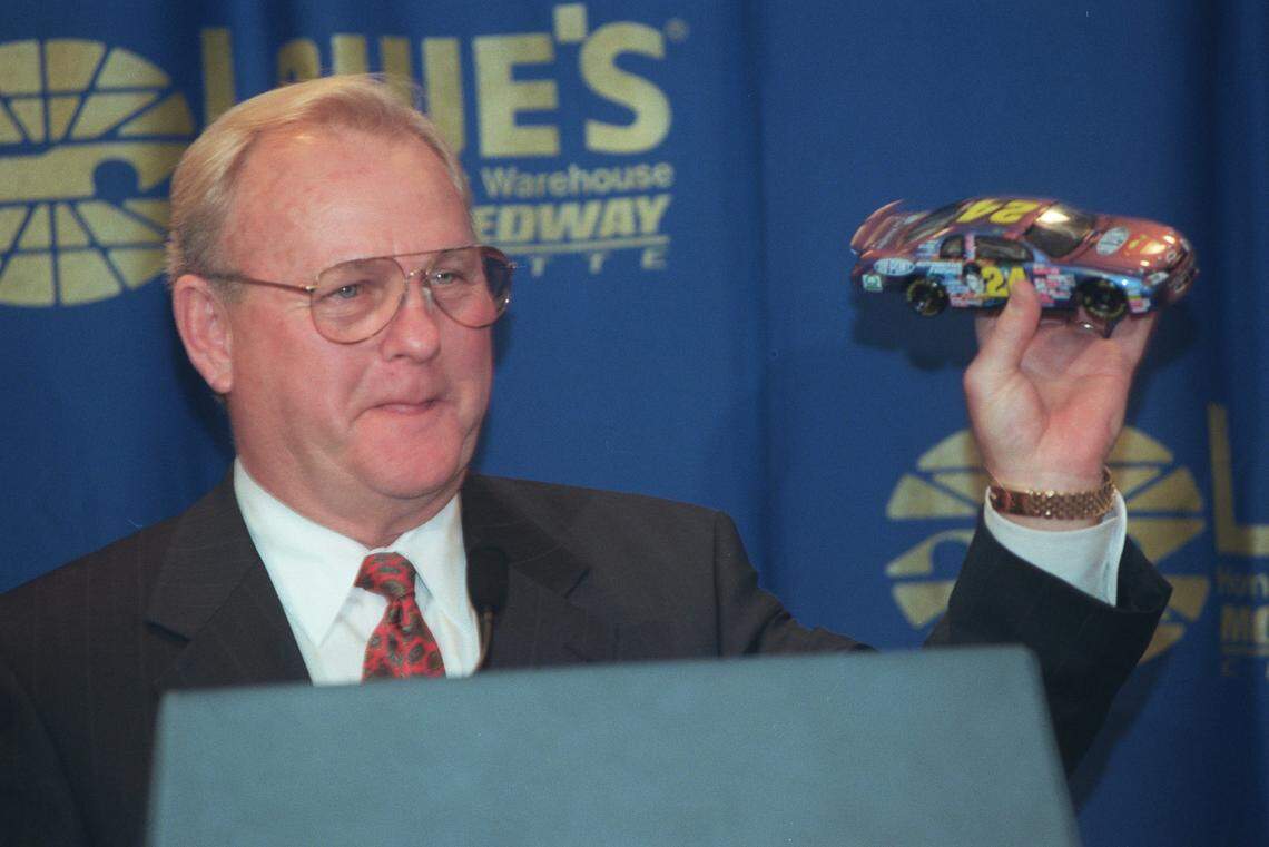 Humpy Wheeler holds up his prediction of the winner of the 1999 NASCAR Winston Select at a press conference held at the Speedway Club in Concord.