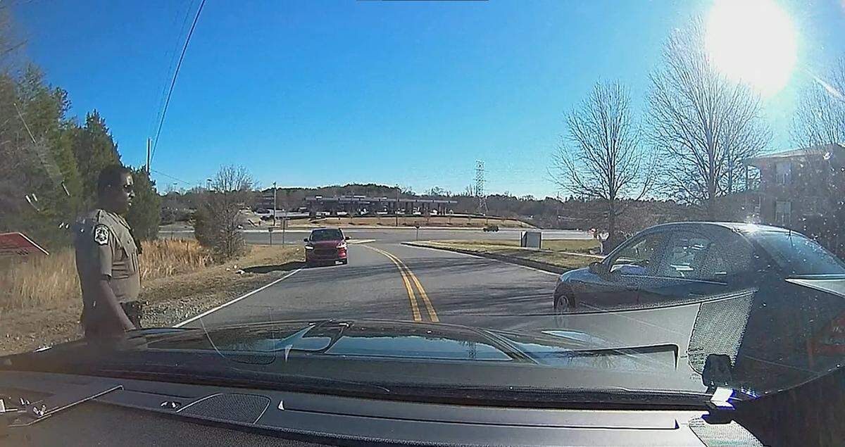 Dashcam video from the Mecklenburg County Sheriff’s Deputy Dijon Whyms’ vehicle shows him moments before he is shot on Feb. 19, 2022.