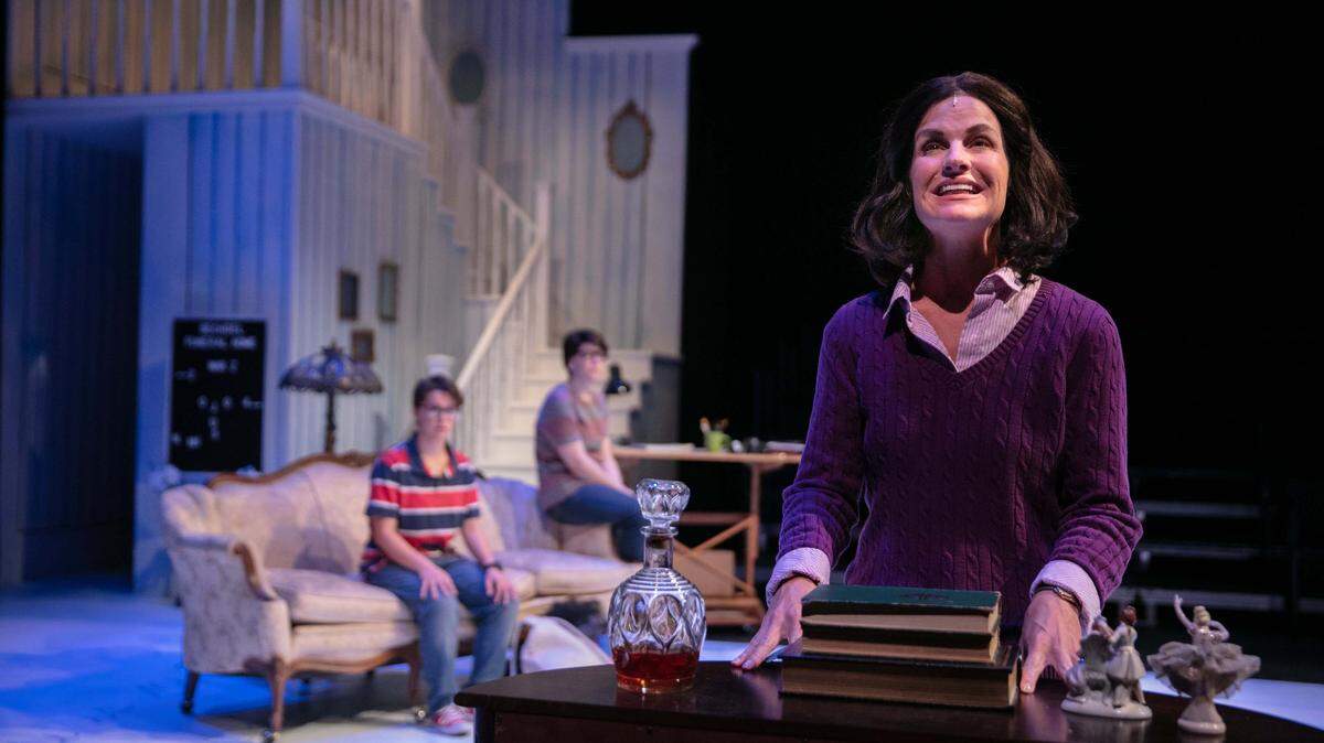 From left, Amanda Ortega, Lisa Hatt and Lisa Schacher star in “Fun Home,” a Tony-winning musical based on the memoirs of Alison Bechdel, who grew up in a Pennsylvania funeral home.