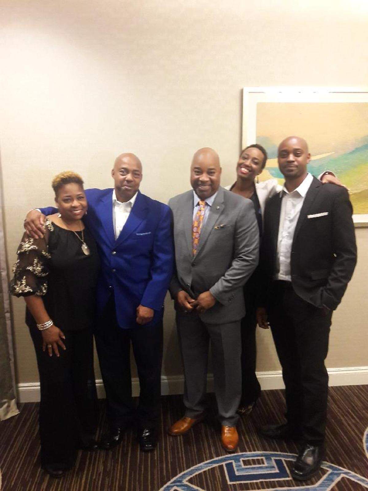 Former Garinger High QB Gene Brown (gray suit) became the first black quarterback inducted into the Citadel’s Hall of Fame.