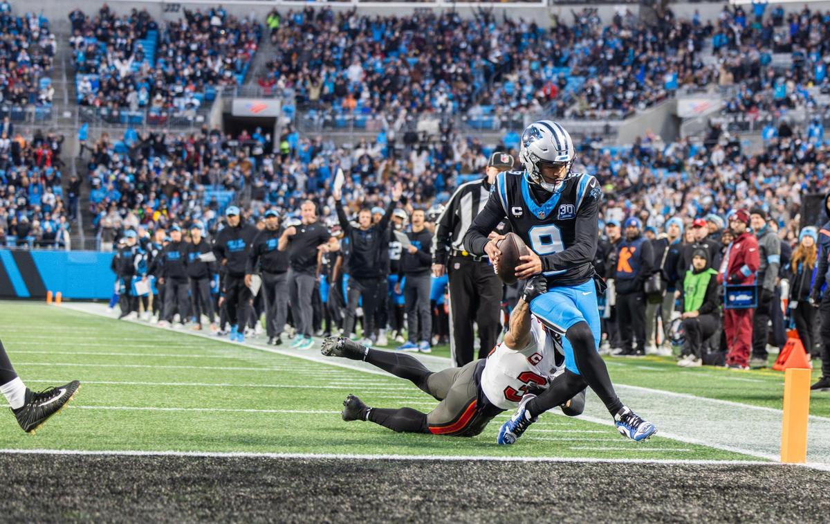 Carolina Panthers quarterback Bryce Young (9) scores on a 10-yard touchdown run against Tampa Bay Sunday.