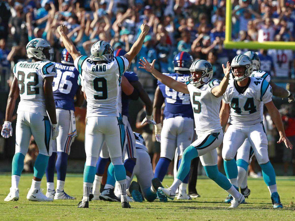 Carolina Panthers’ Graham Gano (9) celebrates his game-winning field goal against the New York Giants with Michael Palardy (5) in the second half of an NFL football game in Charlotte, N.C., Sunday, Oct. 7, 2018.