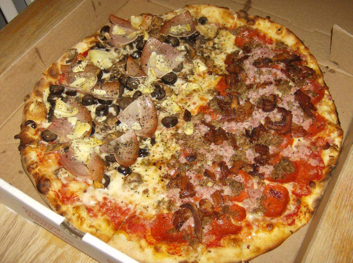 A photo of a Luisa’s Brick Oven pizza in 2008 showed half Milano (artichoke hearts, prosciutto, mushrooms, black olives, mozzarella), and half bacon, ham and pepperoni. “Luisa’s pizza crust is thin, but not crunchy, chewy but not tough. Two slices of pizza is usually my limit, but before I knew it, I had devoured four slices of the Milano,” Robin Domeier wrote in a restaurant review in The Charlotte Observer in 2008.