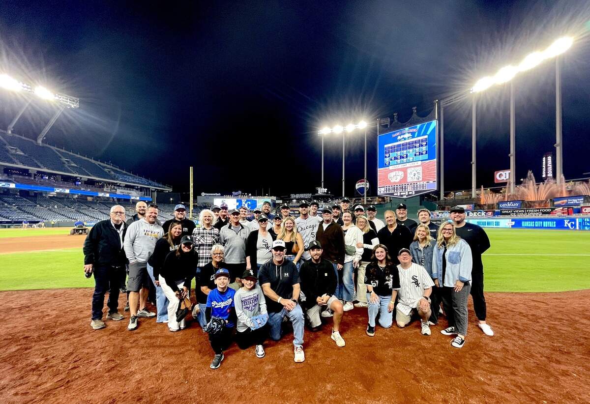 A portion of the group that made the trip from Indianola, Iowa, to Kansas City to watch hometown hero Duncan Davitt play in his first MLB game for the Chicago White Sox. Davitt has spent most of the spring and summer for the White Sox’s AAA affiliate, the Charlotte Knights.