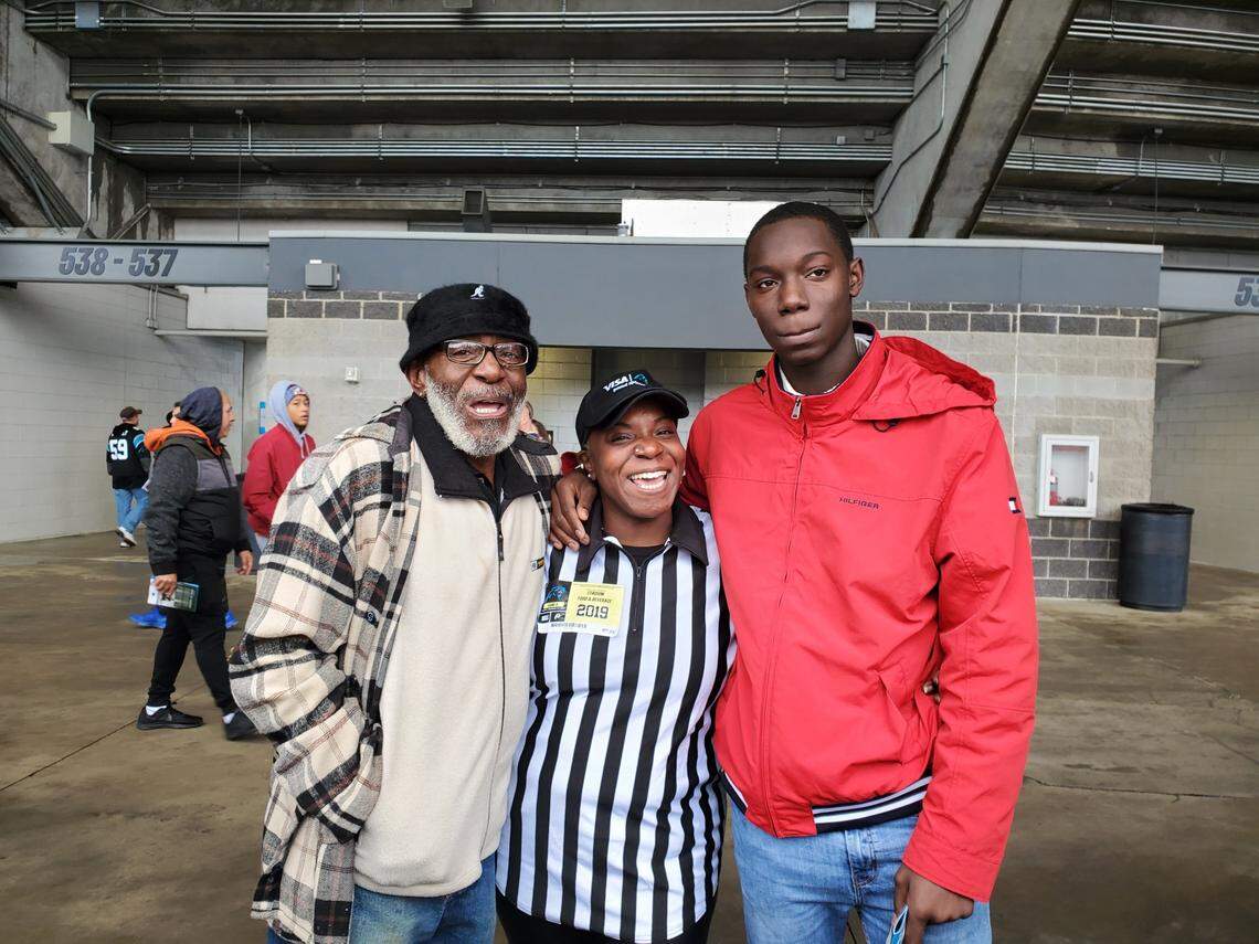 Siddiquh Cooper, with her father, Abdul Siddiq Musa, and her son, Tyliq Laws